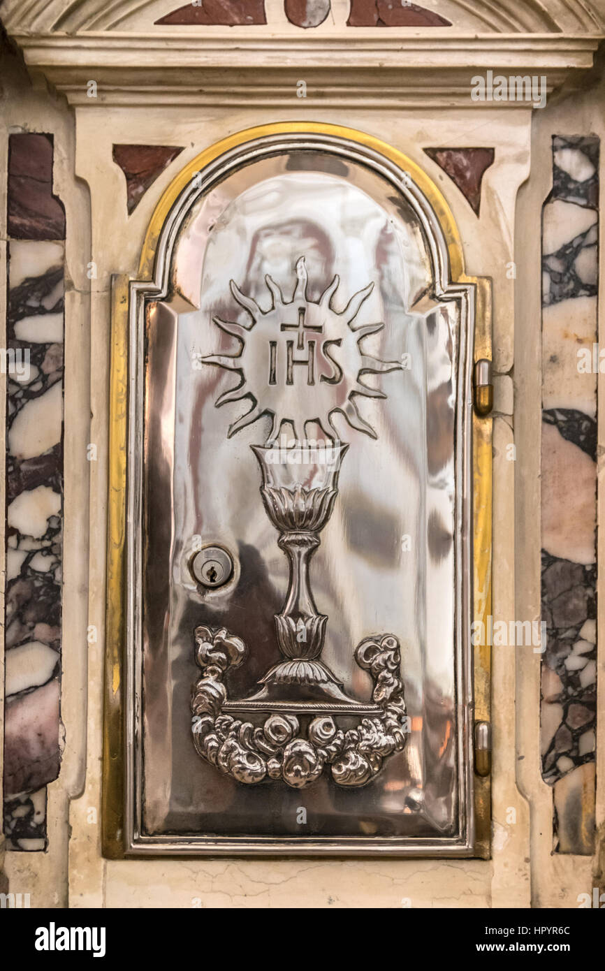 Detail of a tabernacle in a Catholic church in which are preserved the consecrated hosts after the Eucharistic celebration. Stock Photo