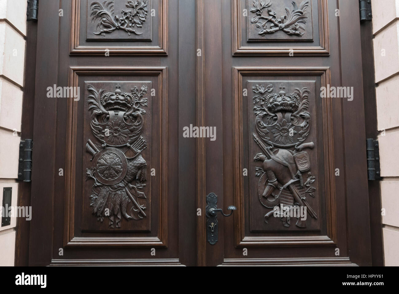 Wooden door with intricate designs at the Zeughaus Museum, Berlin, Germany Stock Photo