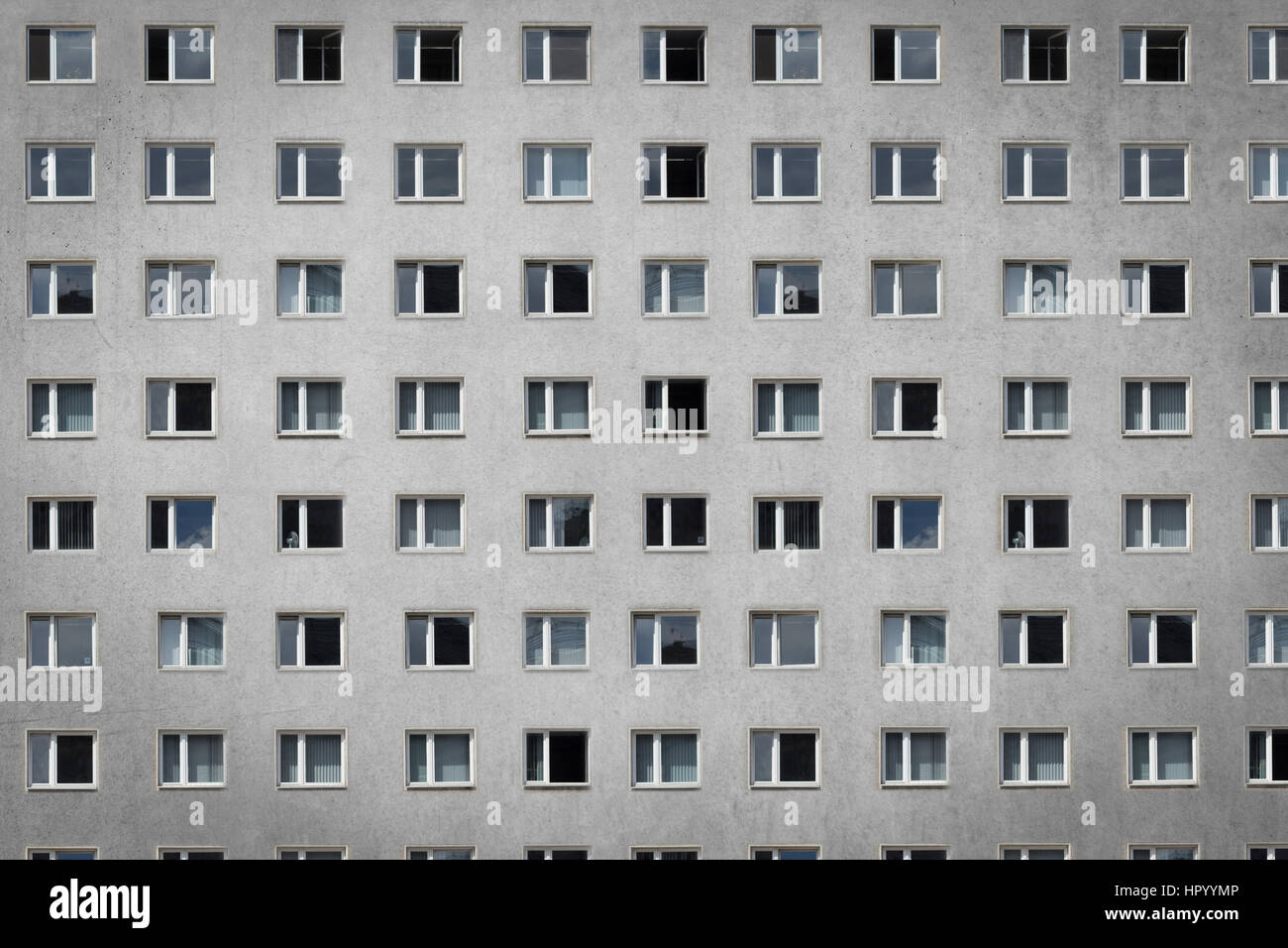 many windows on building facade - apartment block Stock Photo