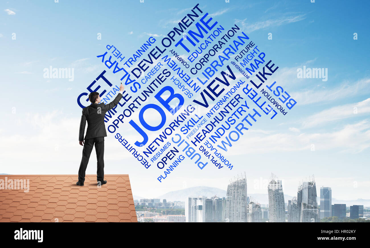 Businessman writing business related and success conceptual words ...