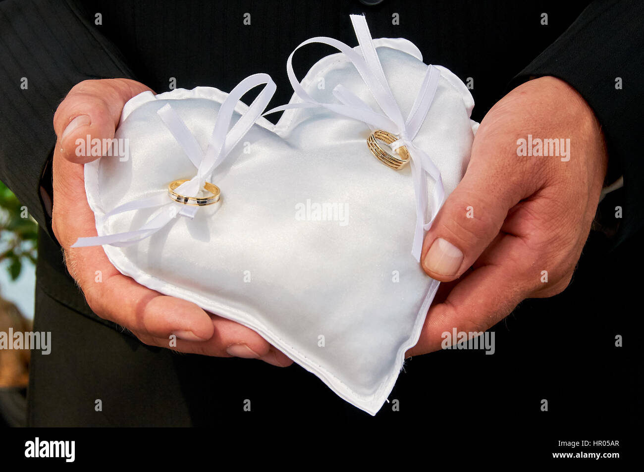 Premium Photo | Wedding rings on a small pillow at a marriage ceremony idea  for event agencies