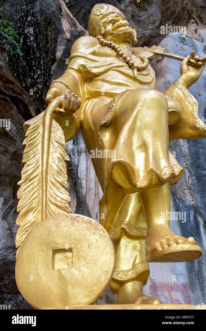golden statue of the Chinese god of a Buddhist temple Stock Photo