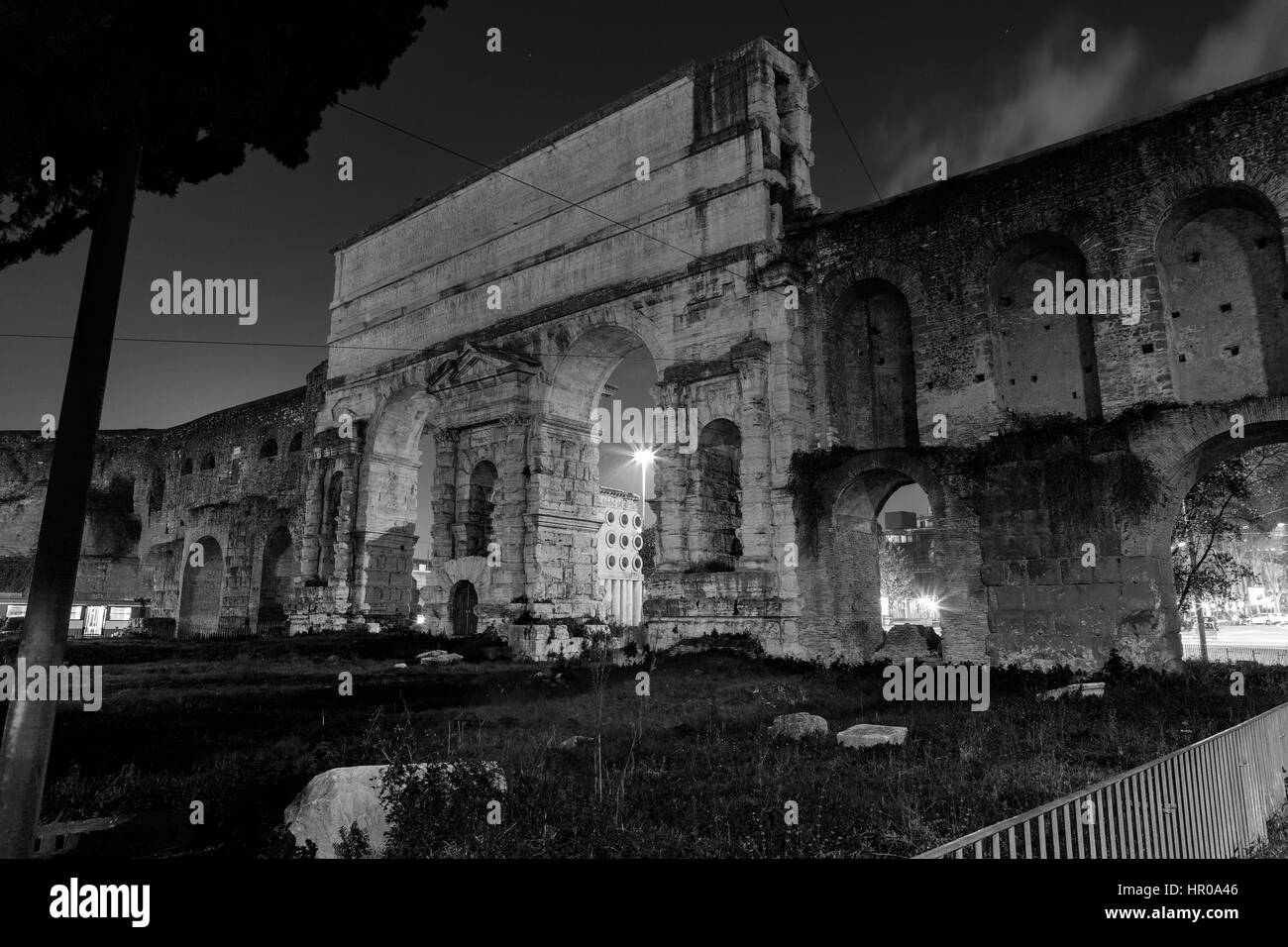 Porta Maggiore at night in Rome Stock Photo