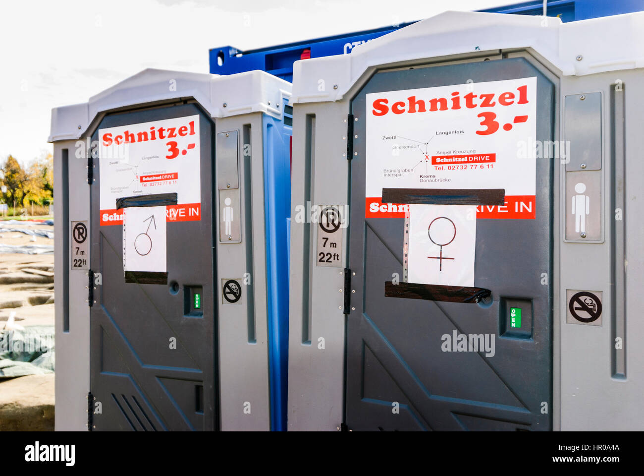 Furth bei Göttweig, Mobile toilets with advertising for schnitzel food, Wachau, Niederösterreich, Lower Austria, Austria Stock Photo