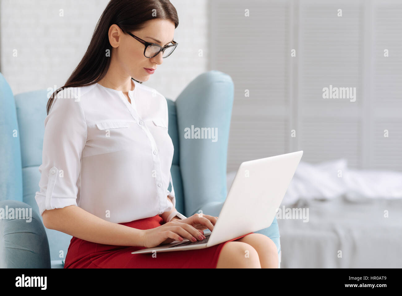 Involved In Work Serious Hard Working Smart Woman Holding A Laptop Stock Photo Alamy