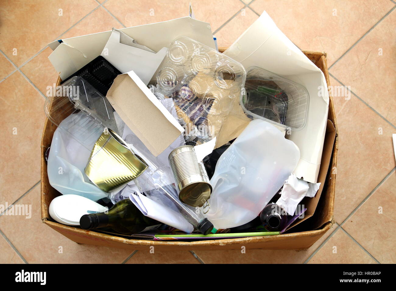 Box of domestic packaging waste ready for recycling. Recycling domestic waste is essential for