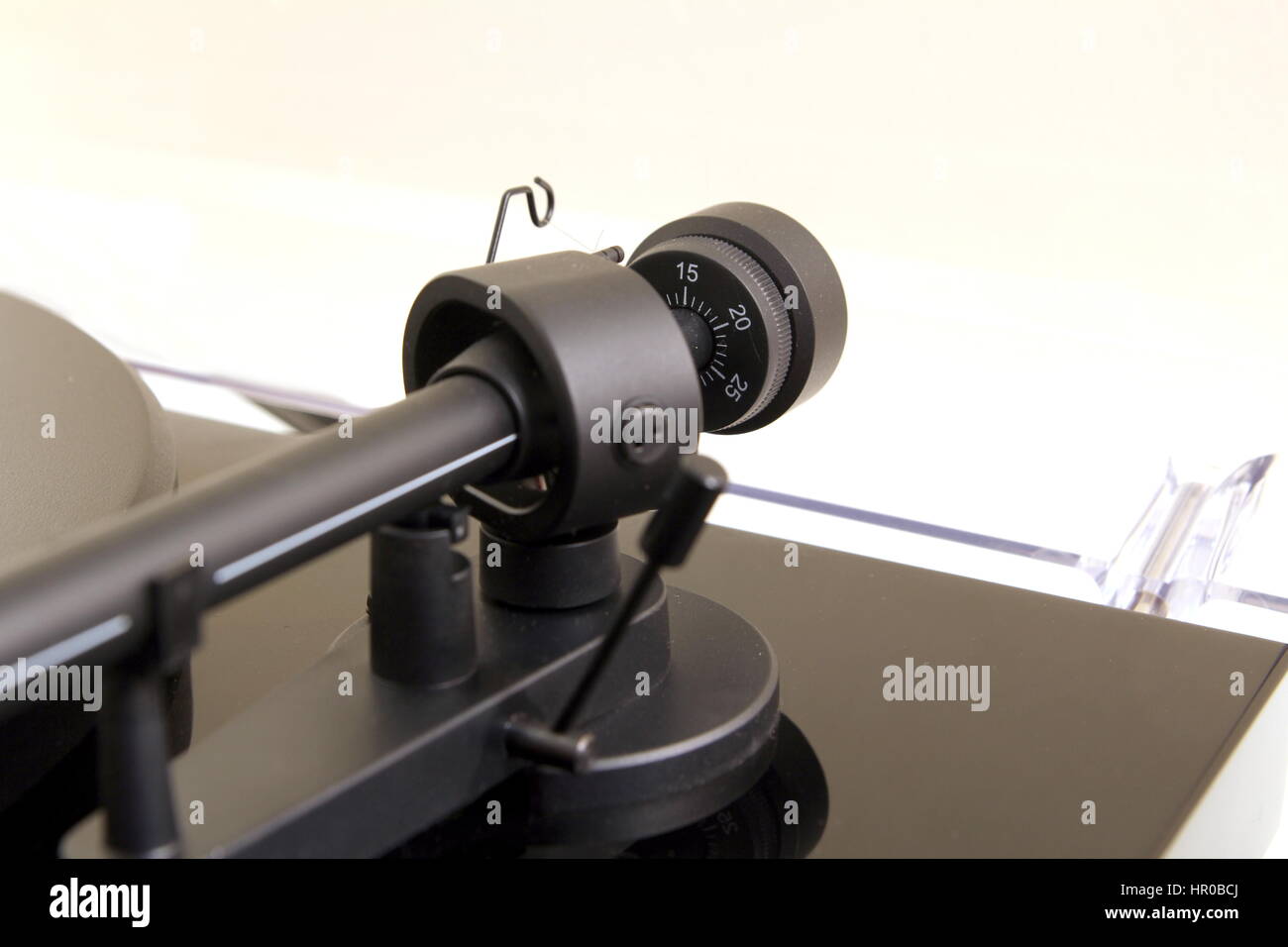 Tracking force adjustment wheel on a vinyl turntable record player