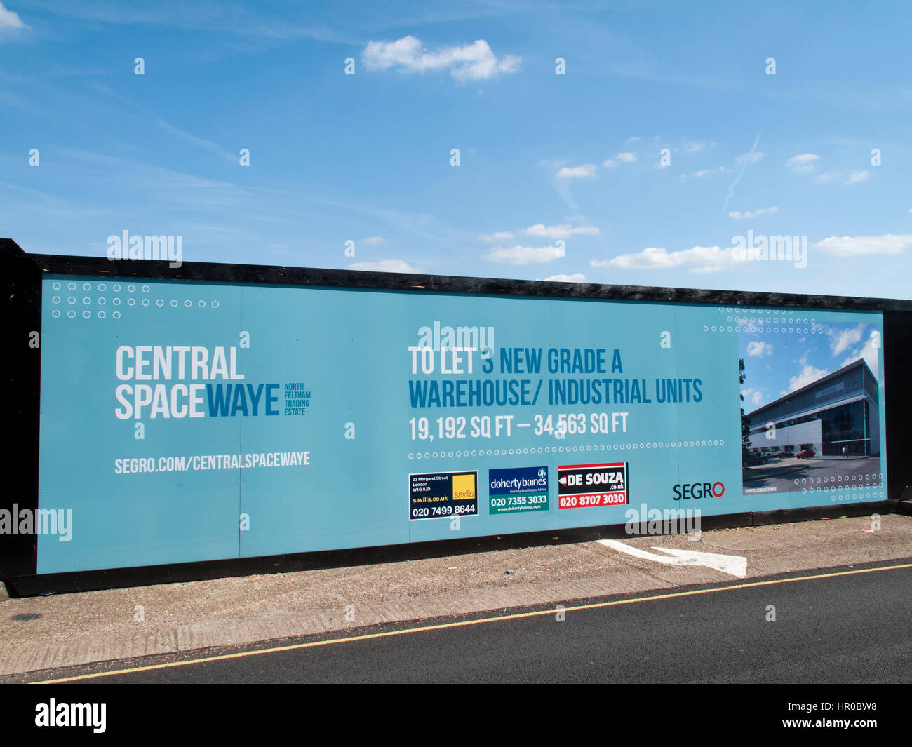 Commercial warehouse industrial units to let advertising sign on Stock