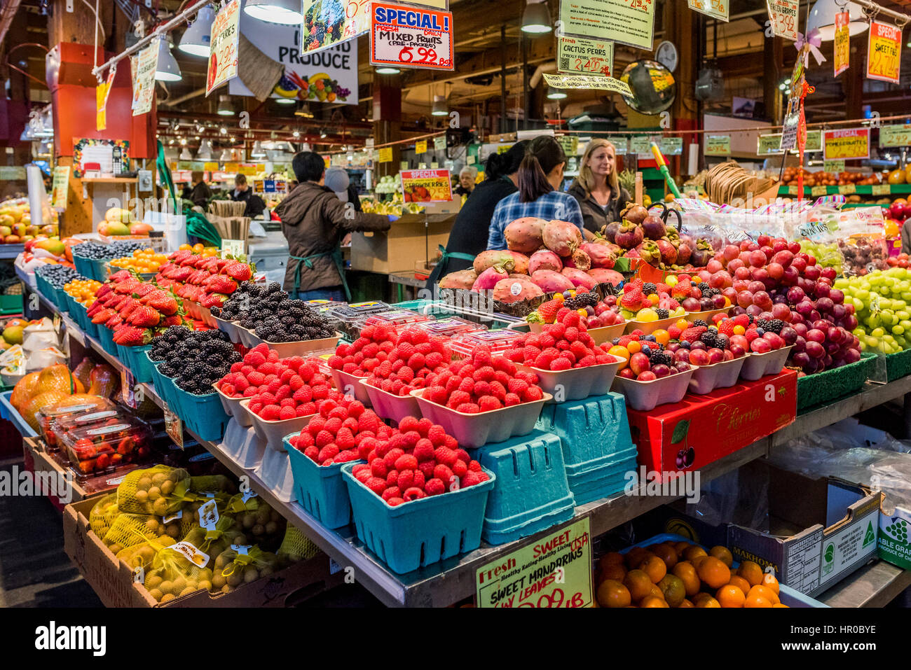 Produce stand with fruit and berries, Granville Island Public Market