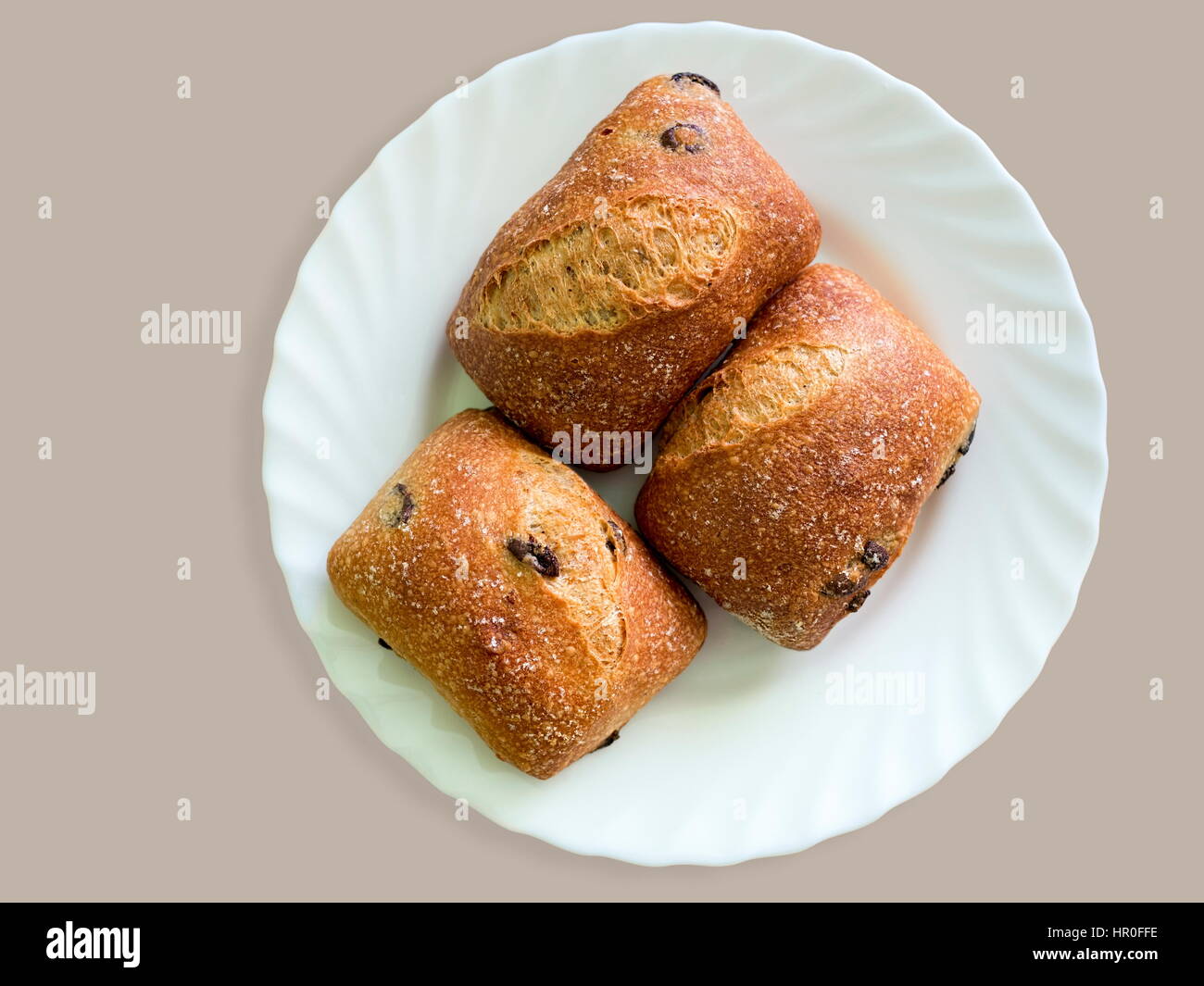 Fresh baked bread with black olive for delicious breakfast Stock Photo