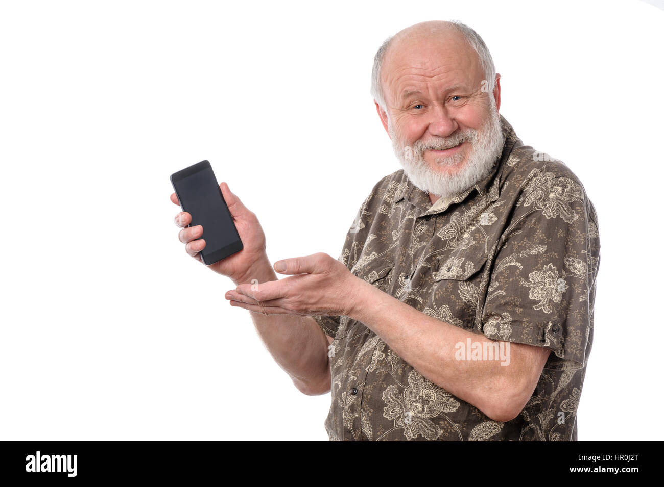 Senior cheerful bald and bearded white haired man showing something at smartphone screen, isolated on white background Stock Photo
