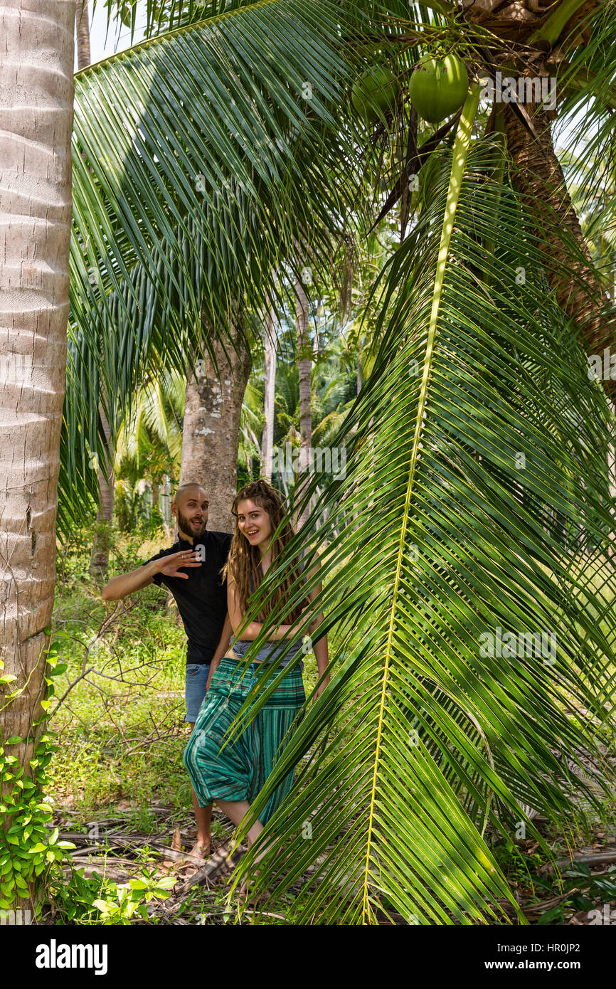 Young couple in tropical forests of Thailand Stock Photo