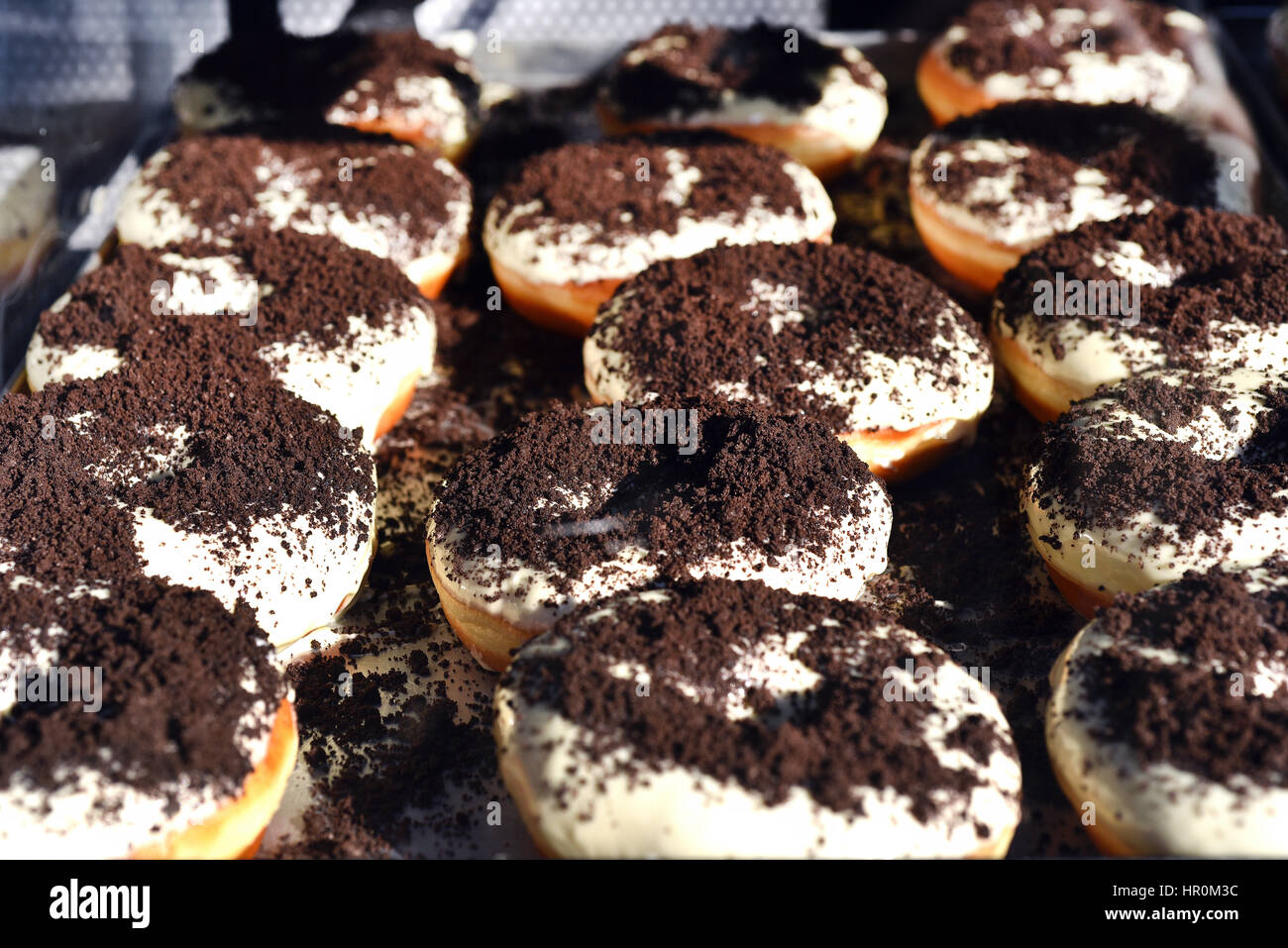 Donuts with sugar glaze and cocoa Stock Photo Alamy