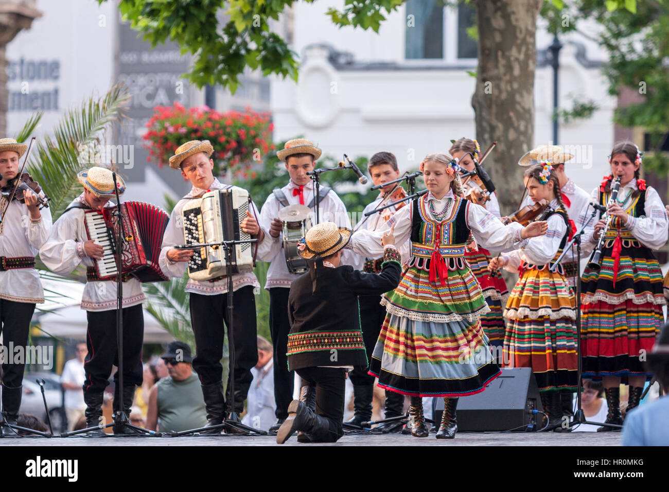 Boys and girls in folk costume performing a Hungarian folk dance in Budapest, Hungary Stock Photo