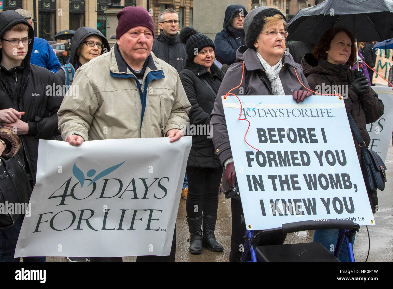 Glasgow, Scotland, UK. 25th Feb, 2017. '40 Days for Life', a Christian Pro-Life and anti abortion group held a prayer meeting in George Square, Glasgow, in preparation for 40 days of prayer, beginning on Ash Wednesday (1 March) and ending on Palm Sunday (9 April), hoping to have the Scottish Executive repeal the Abortion Act 1967. The prayer meeting was confronted by counter demonstration of activists promoting international womens' rights and advocating the 'Right to Choose' Credit: Findlay/Alamy Live News Stock Photo