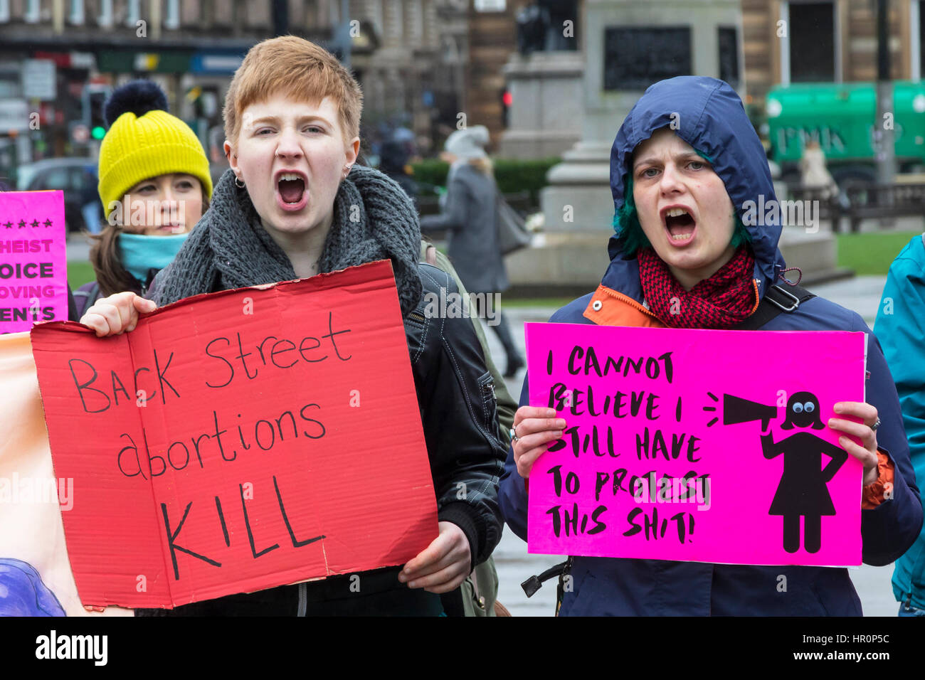 Glasgow, Scotland, UK. 25th Feb, 2017. "40 Days for Life", a Christian Pro-Life and anti abortion group held a prayer meeting in George Square, Glasgow, in preparation for 40 days of prayer, beginning on Ash Wednesday (1 March) and ending on Palm Sunday (9 April), hoping to have the Scottish Executive repeal the Abortion Act 1967. The prayer meeting was confronted by counter demonstration of activists promoting international womens' rights and advocating the "Right to Choose" Credit: Findlay/Alamy Live News Stock Photo