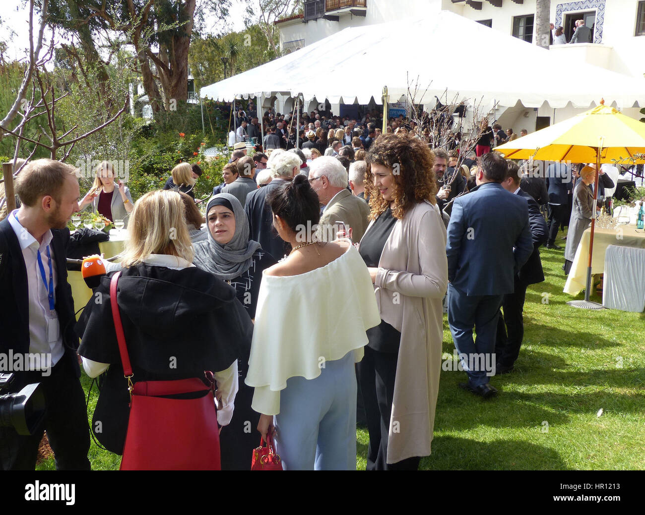 Los Angeles, US. 25th Feb, 2017. Hala Kamil from Syria (3rd l), the central figure of the refugee documentary 'Watani: My Homeland, photographed during the traditional reception for the German Oscar nominees at the historical Villa Aurora in Los Angeles, US, 25 February 2017. The Academy Award ceremony takes place on 26 February 2017. Photo: Barbara Munker/dpa/Alamy Live News Stock Photo