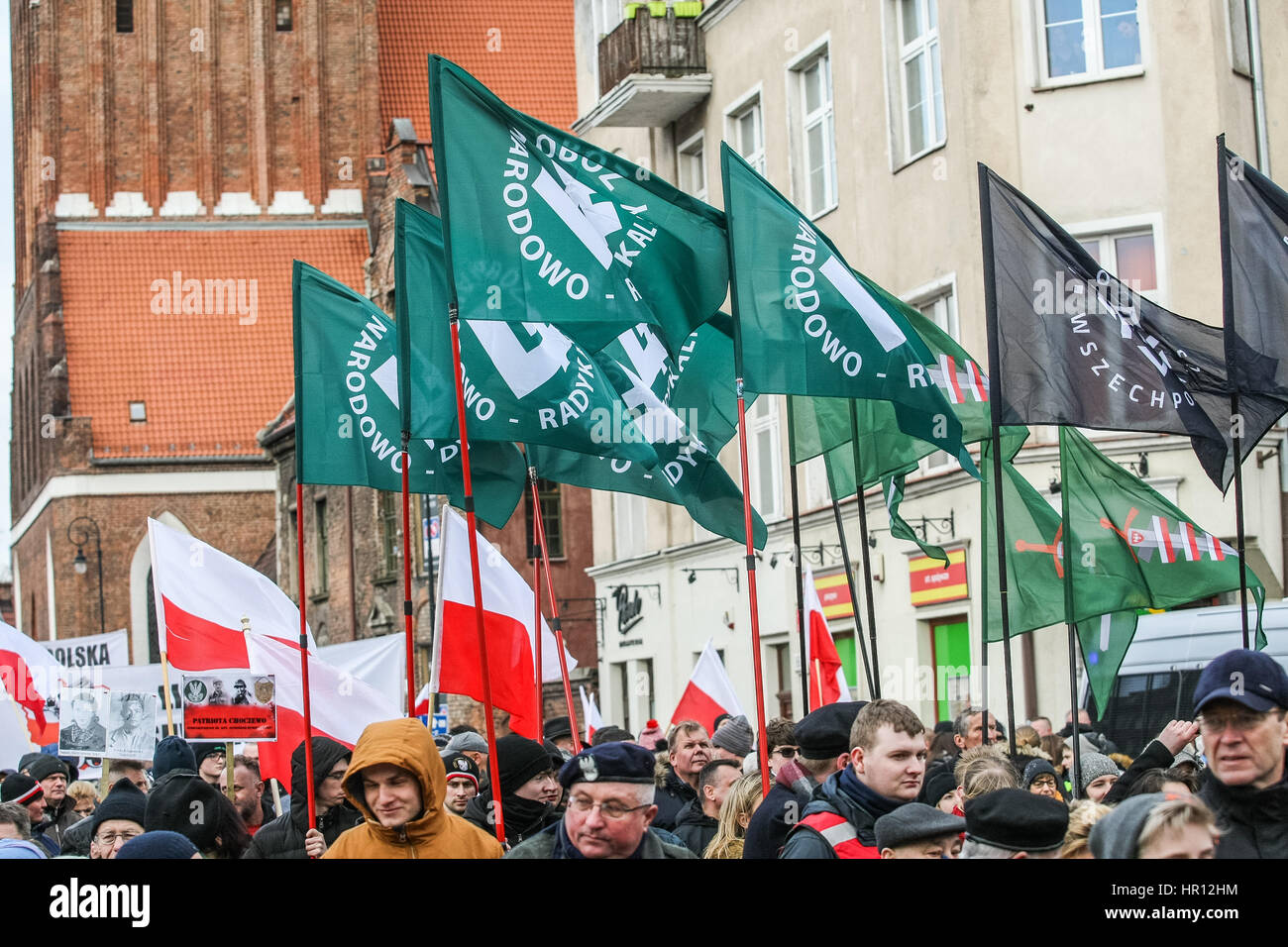 Gdansk, Poland. 26th February 2017. Far right nacionalist organization ONR (Oboz Narodowo Radykalny ) members with Falanga flags are seen during the Cursed soldiers Day parade on 26 February 2017  in Gdansk, Poland. The Cursed soldiers were a members of anti-communist Polish resistance movements formed in the later stages of World War II and its aftermath by some members of the Polish Underground State. Credit: Michal Fludra/Alamy Live News Stock Photo