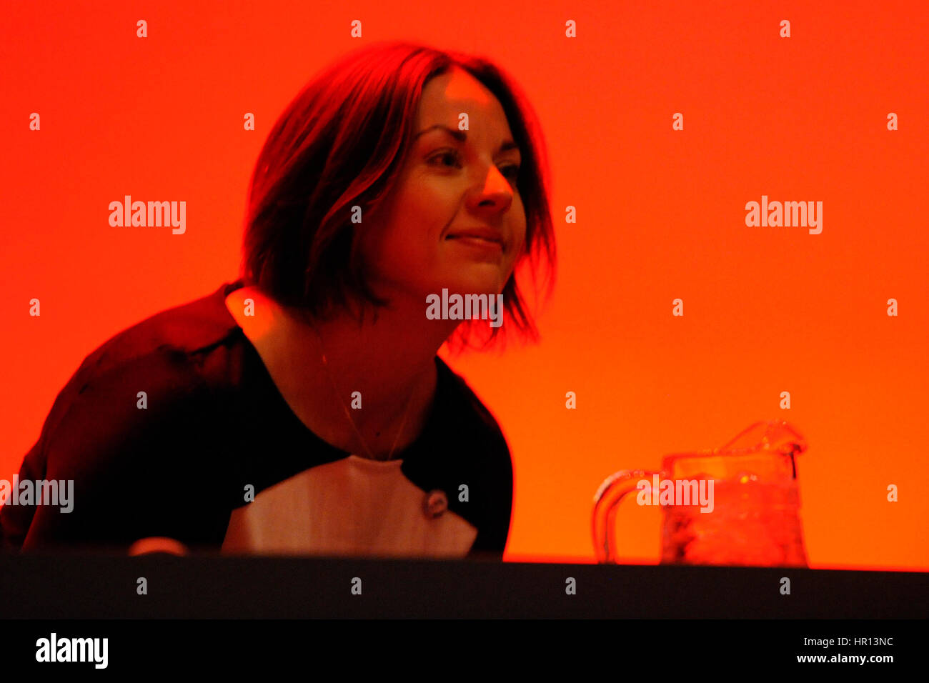 Perth, Scotland, UK. 26th February 2017. Scottish Labour leader Kezia Dugdale Takes her seat on the platform before the stage lights go up, ahead of Jeremy Corbyn's speech to the Scottish Labour Party conference in Perth, Credit: Ken Jack/Alamy Live News Stock Photo