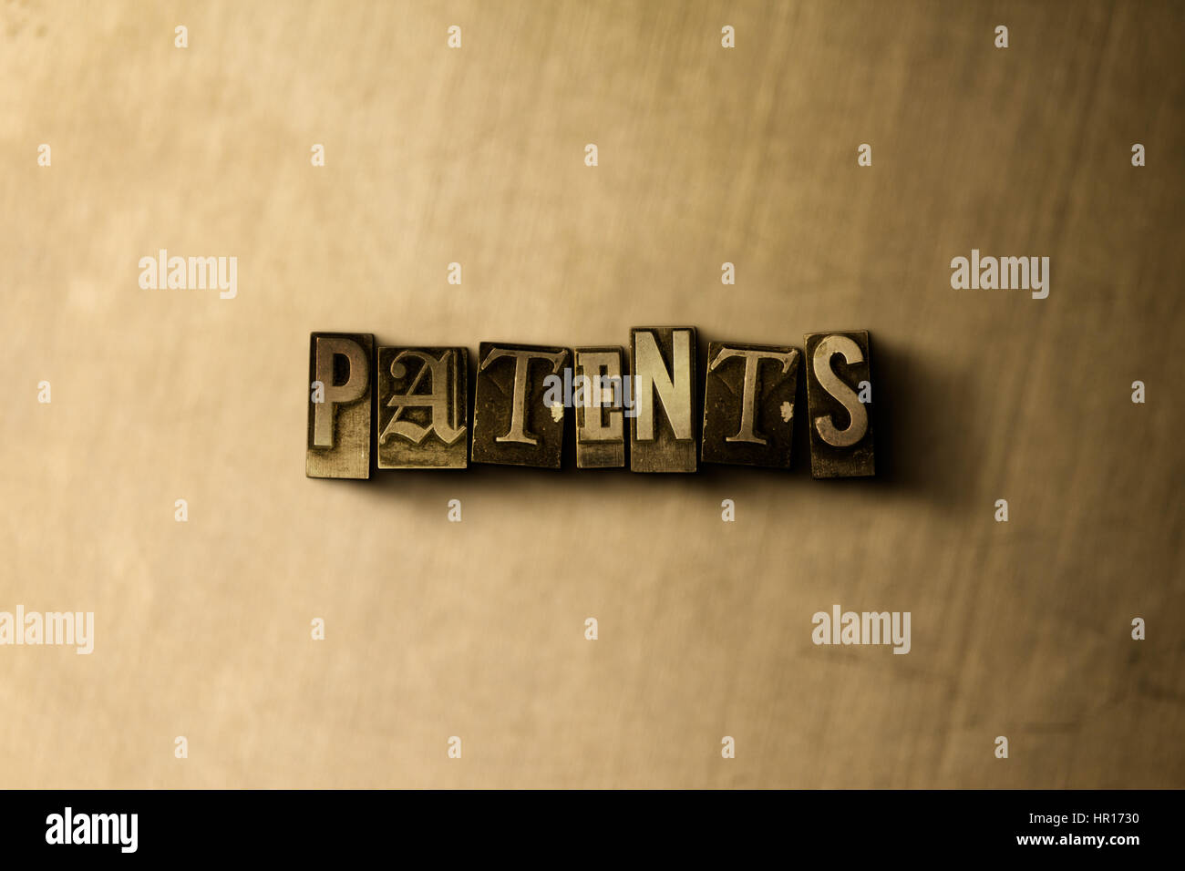 PATENTS - close-up of grungy vintage typeset word on metal backdrop. Royalty free stock - 3D rendered stock image.  Can be used for online banner ads  Stock Photo