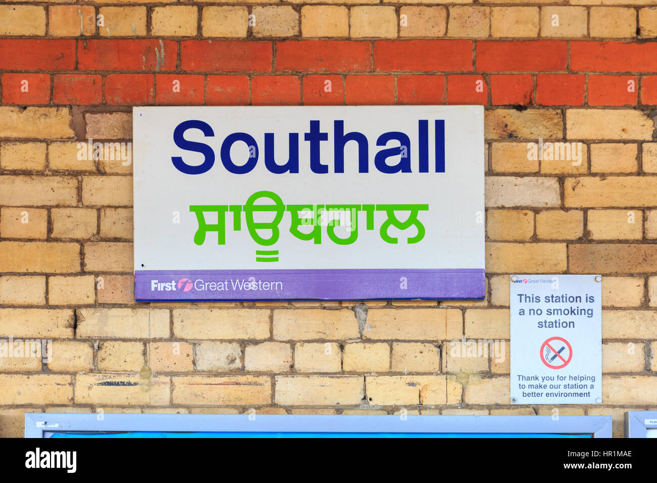 Southall train station sign in English and  Gurmukhī, a script commonly used for Punjabi, Southall, London Stock Photo
