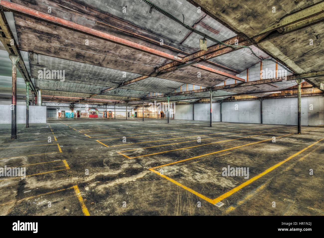Empty warehouse in an abandoned factory Stock Photo