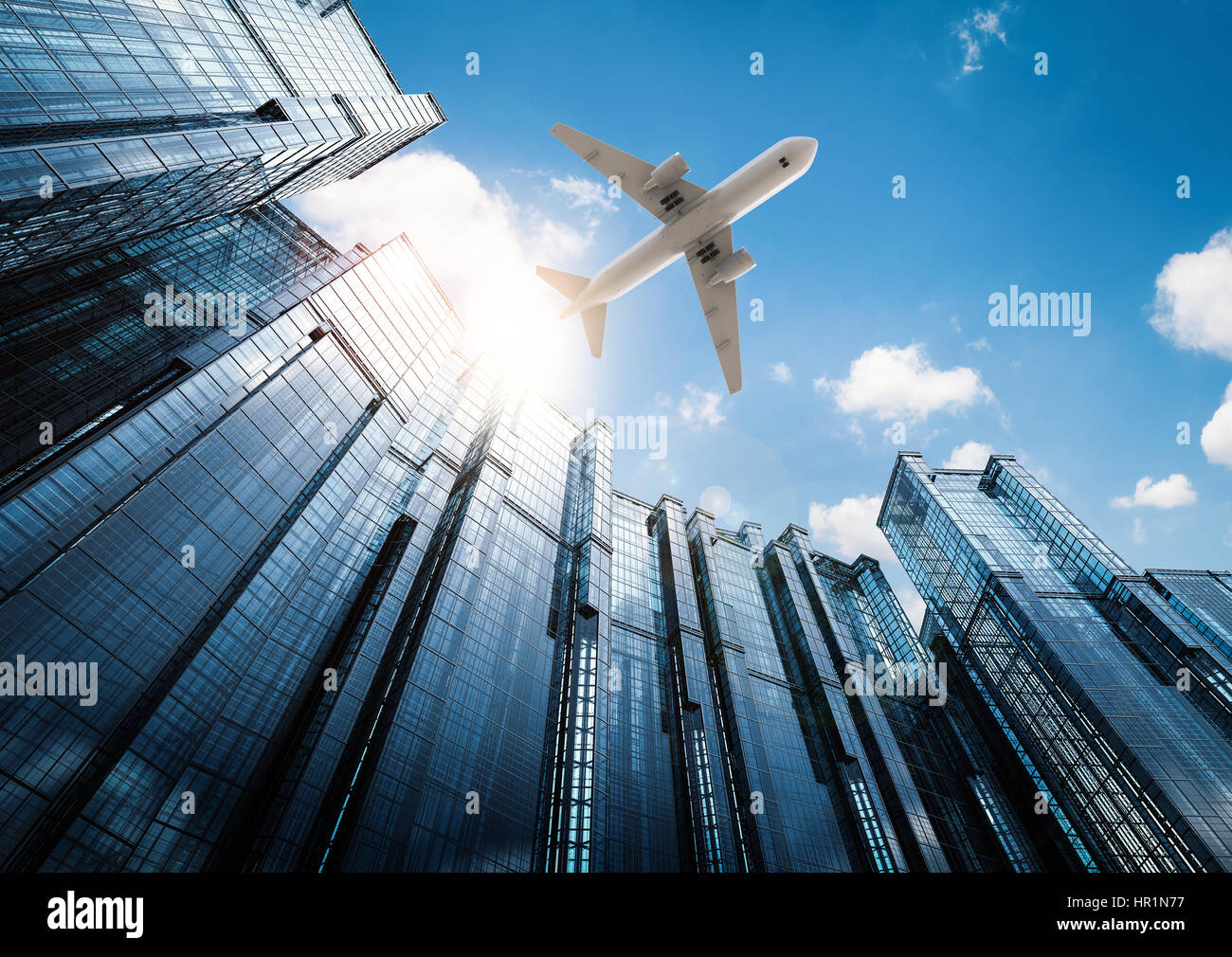 3d rendering airplane flying above high rise building Stock Photo