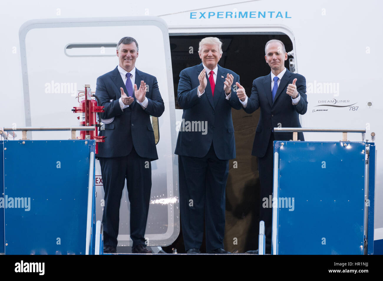 U.S. President Donald Trump with Boeing CEO Dennis Muilenburg, right, and Boeing Commercial Aircraft CEO Kevin McAllister, left, after touring the new Boeing 787-10 Dreamliner aircraft at the Boeing factory February 17, 2016 in North Charleston, SC. Trump is at the factory for the rollout of the new aircraft. Stock Photo
