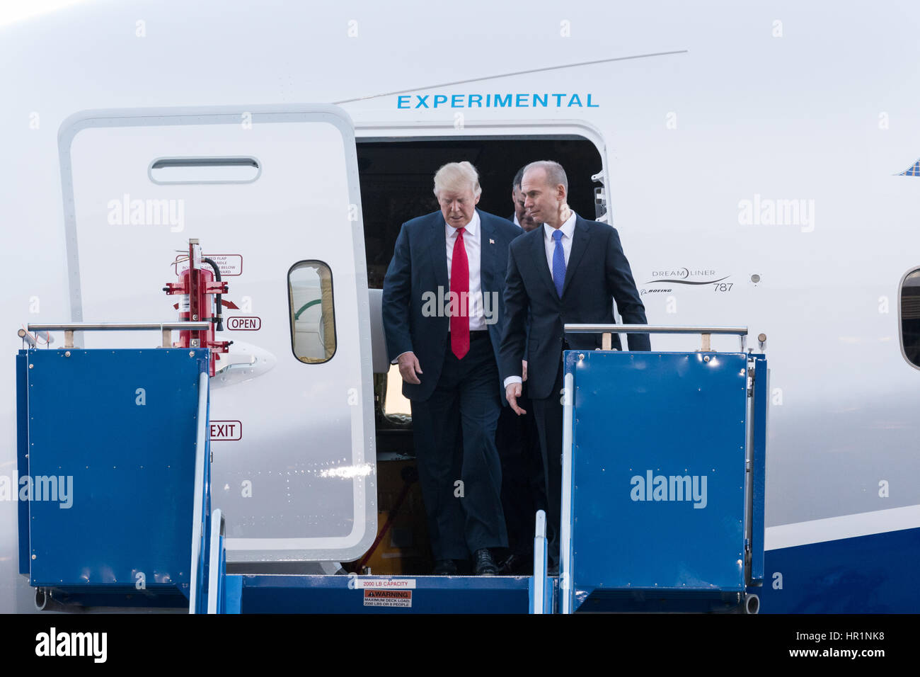 U.S. President Donald Trump with Boeing CEO Dennis Muilenburg, right, after touring the new Boeing 787-10 Dreamliner aircraft at the Boeing factory February 17, 2016 in North Charleston, SC. Trump is at the factory for the rollout of the new aircraft. Stock Photo