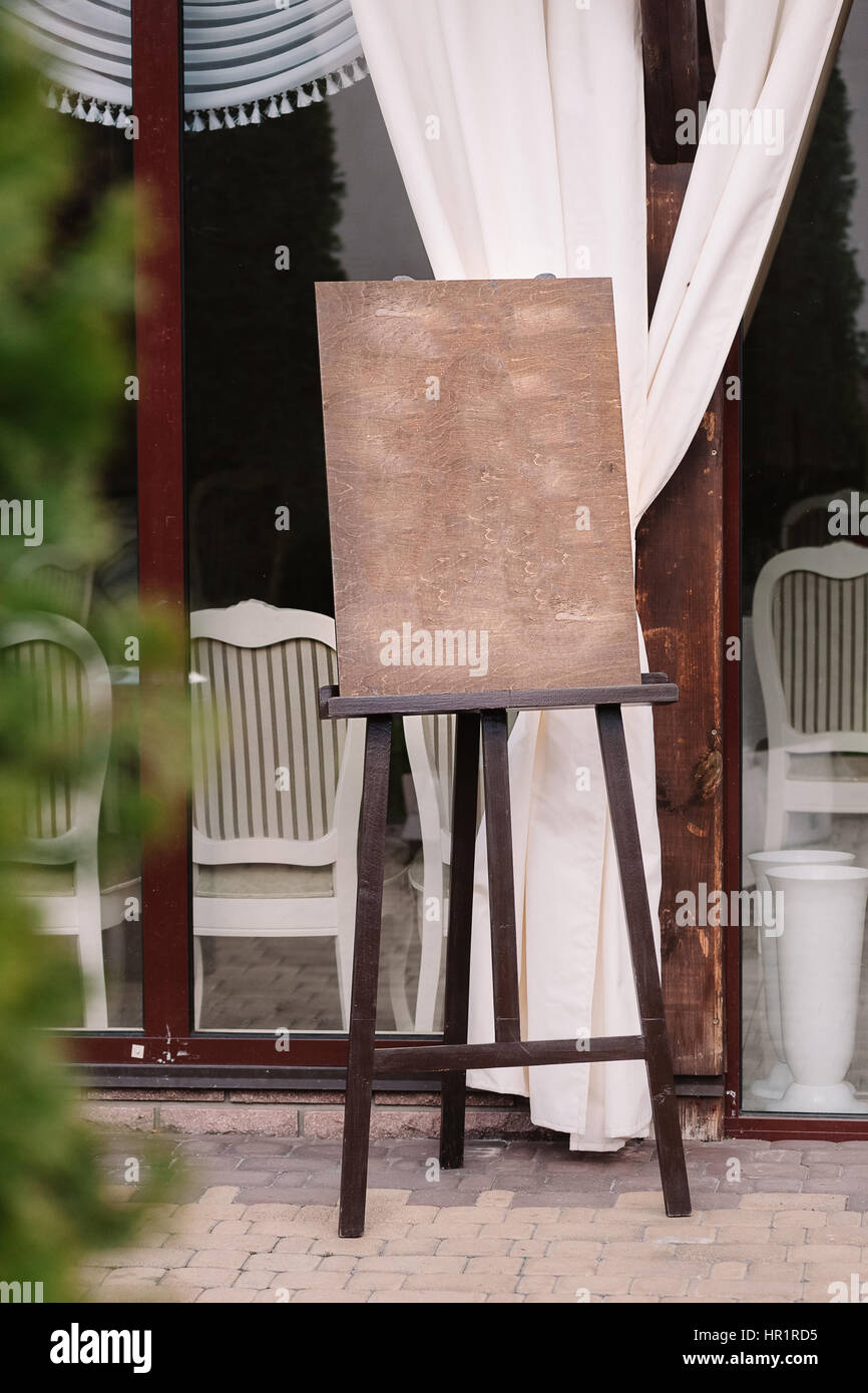 Wedding guest list on wooden easel Stock Photo Alamy