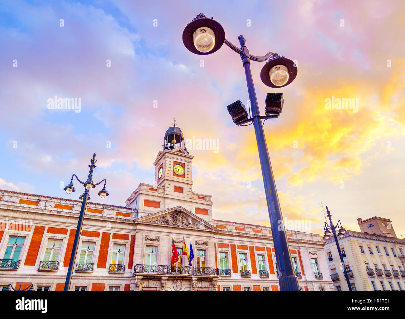 The Puerta del Sol square is the main public square in the city of Madrid, Spain. In the middle of the square is located the office of the President o Stock Photo