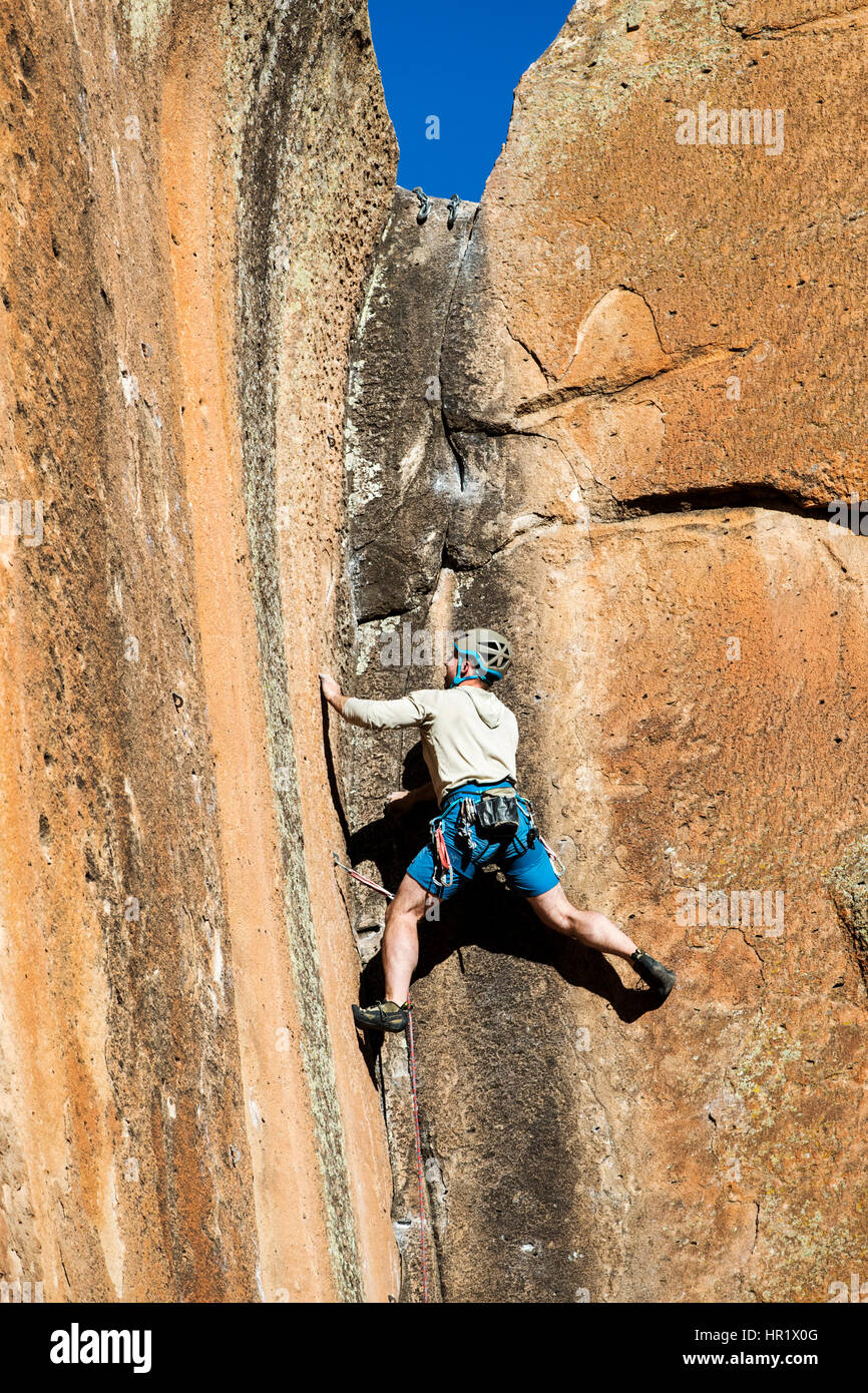 Young man rock climbing; Penitente Canyon; Colorado; USA Stock Photo