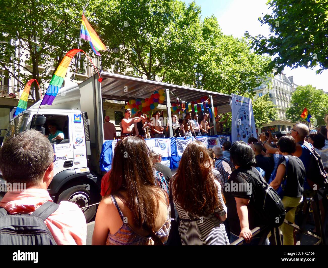 Marche des Fiertés 2015, Paris Pride Parade, truck-style float and crowd watching, Blvd Saint-Michel, Paris, France Stock Photo