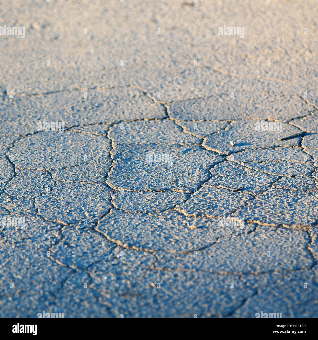 in south africa abstract broke asphalt in the old steet and light Stock