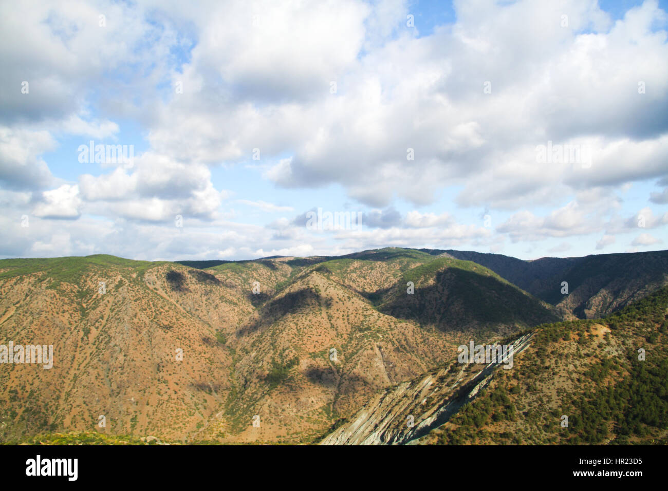 mountain landscape with blue sky and white clouds Stock Photo - Alamy