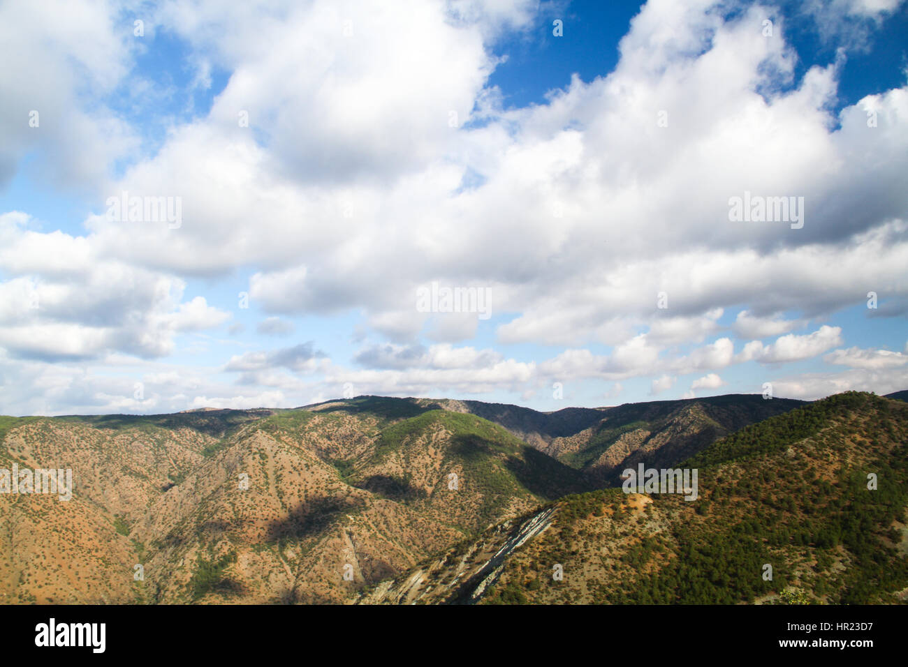mountain landscape with blue sky and white clouds Stock Photo - Alamy