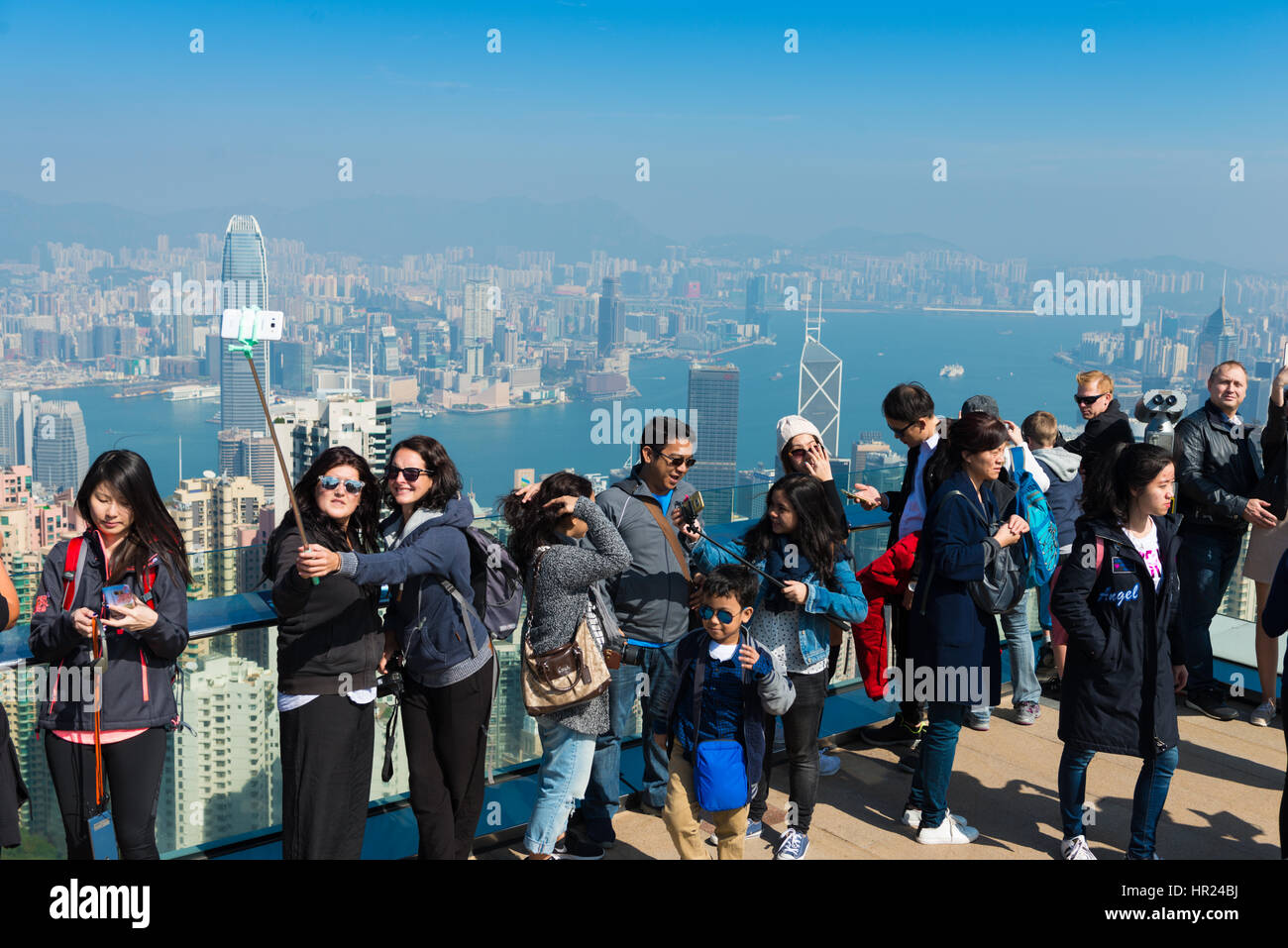 People taking selfie from the Peak with Hong Kong on background Stock ...