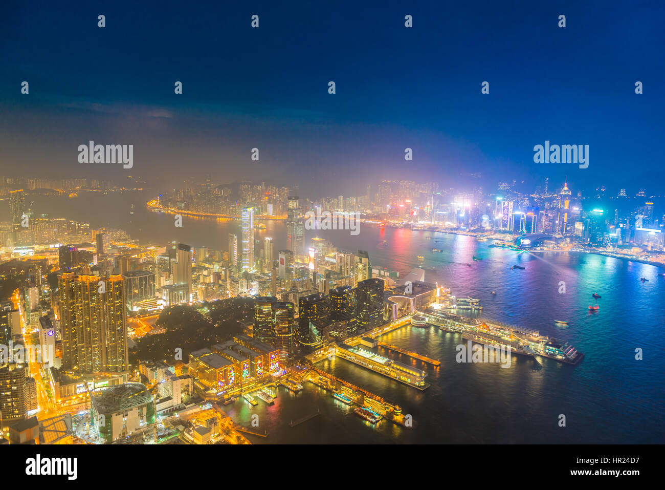Night view of Hong Kong Island, Kowloon and the bay from Sky100 observation deck Stock Photo