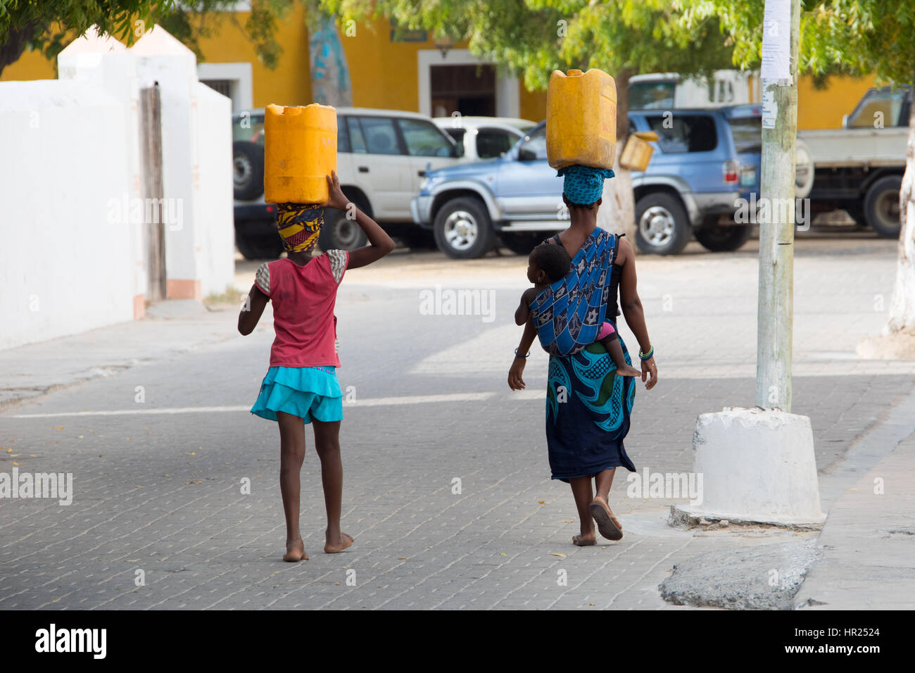Carrying water on Mozambique Island (Ilha de Mocambique), Mozambique Stock Photo