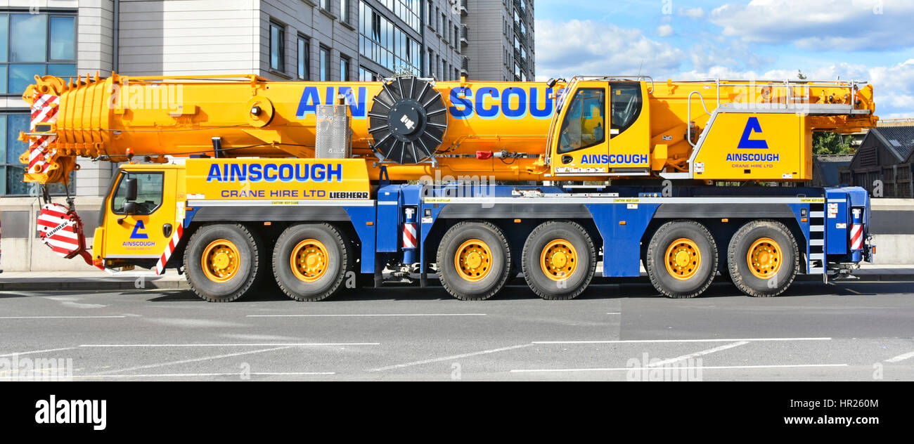 Mobile crane London uk parked in road waiting to move onto a building site crane manufactured by Liebherr Stock Photo