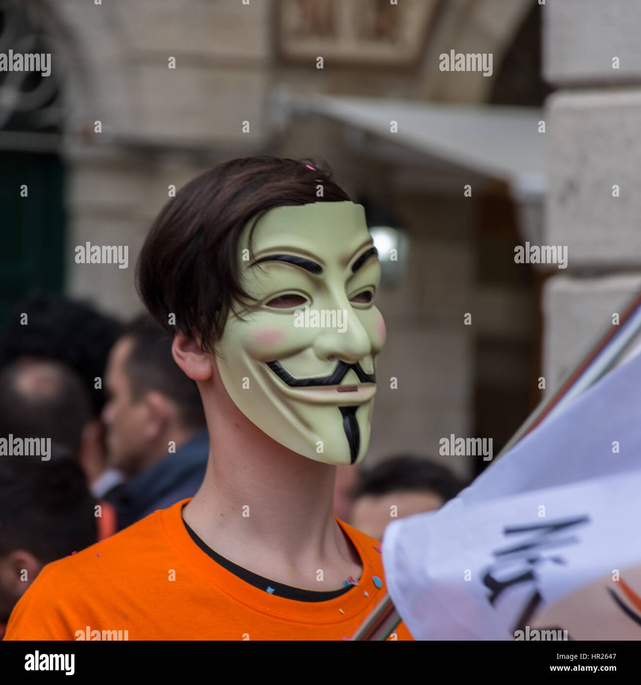 Carnival celebrations in Corfu Greece.. Man wearing the "Anonymous