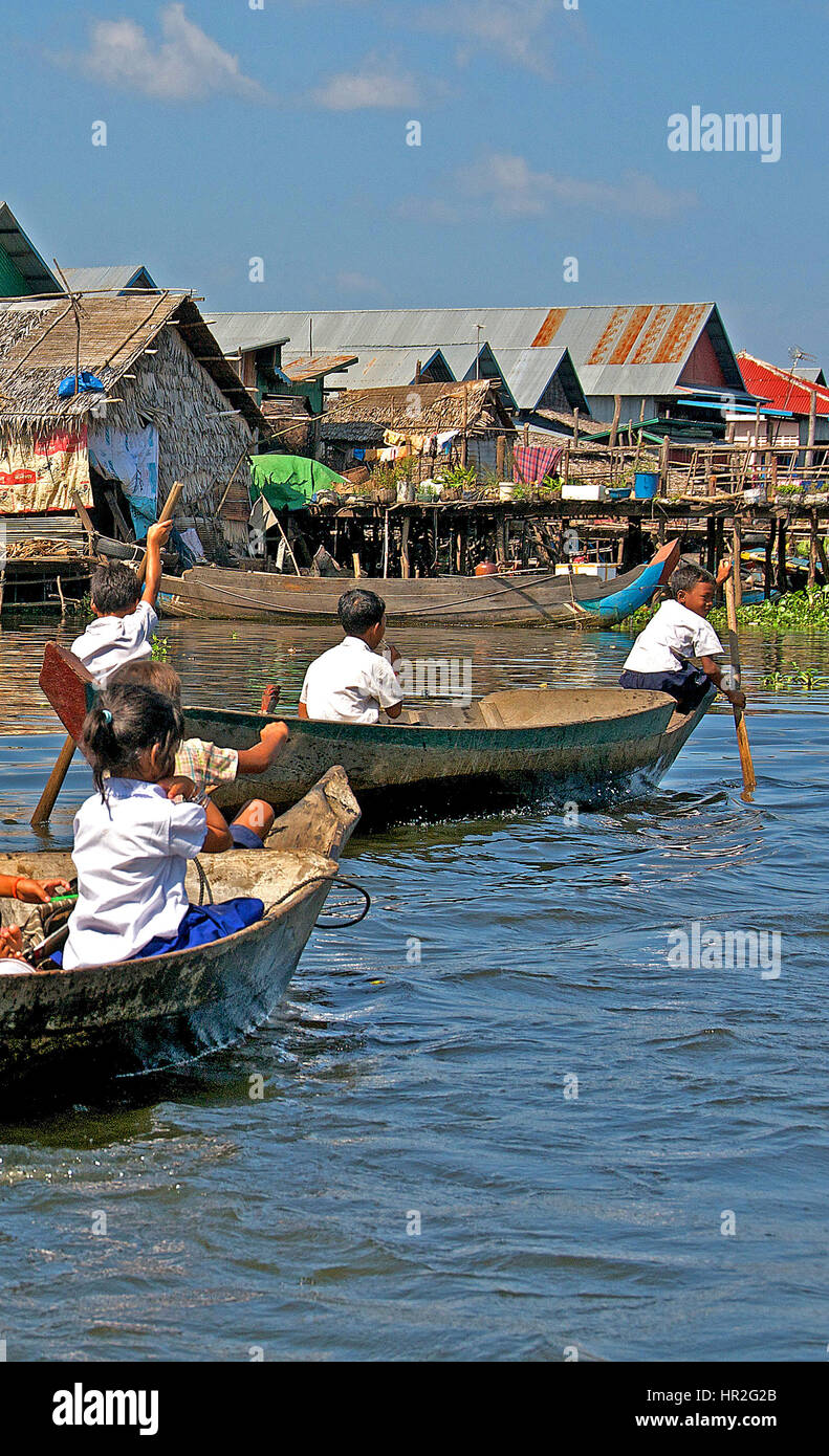 schoolchildren boating onTonle Sap lake, Cambodia Stock Photo