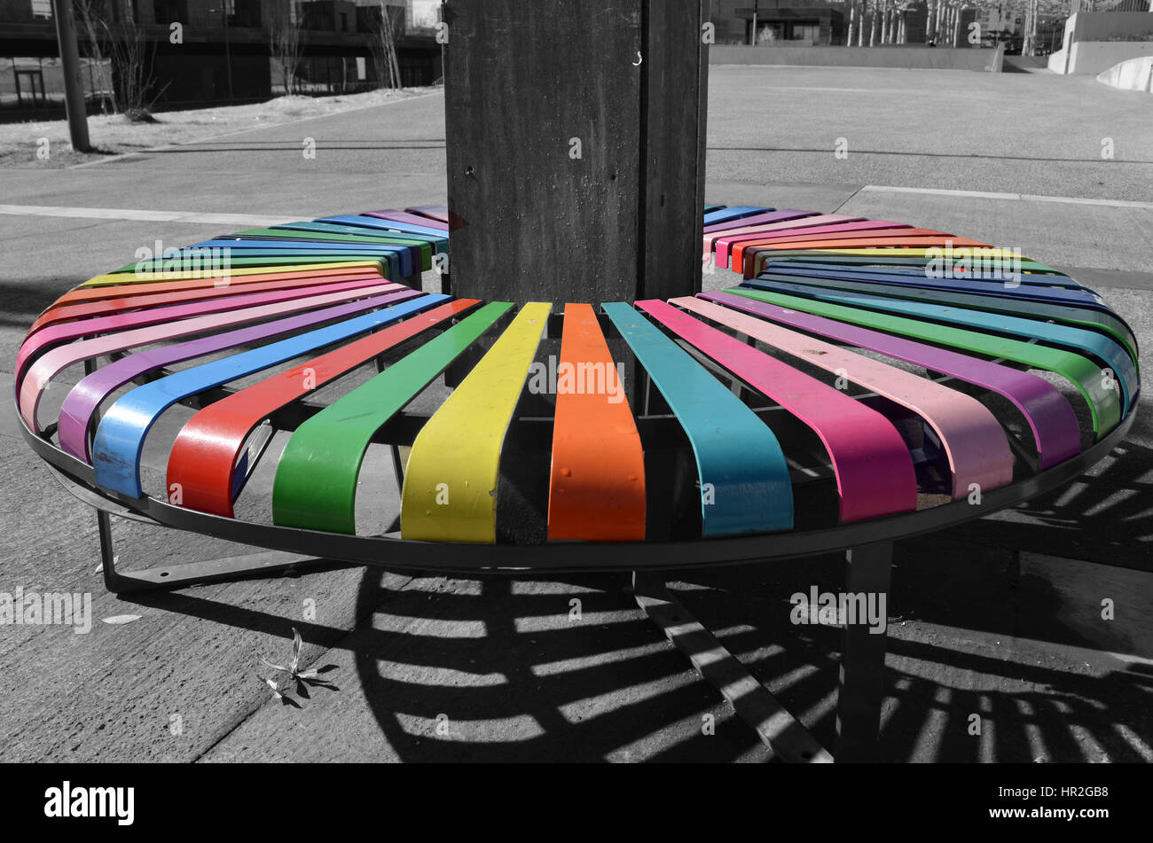 Multicolored public bench in Mourenx, south western France Stock Photo