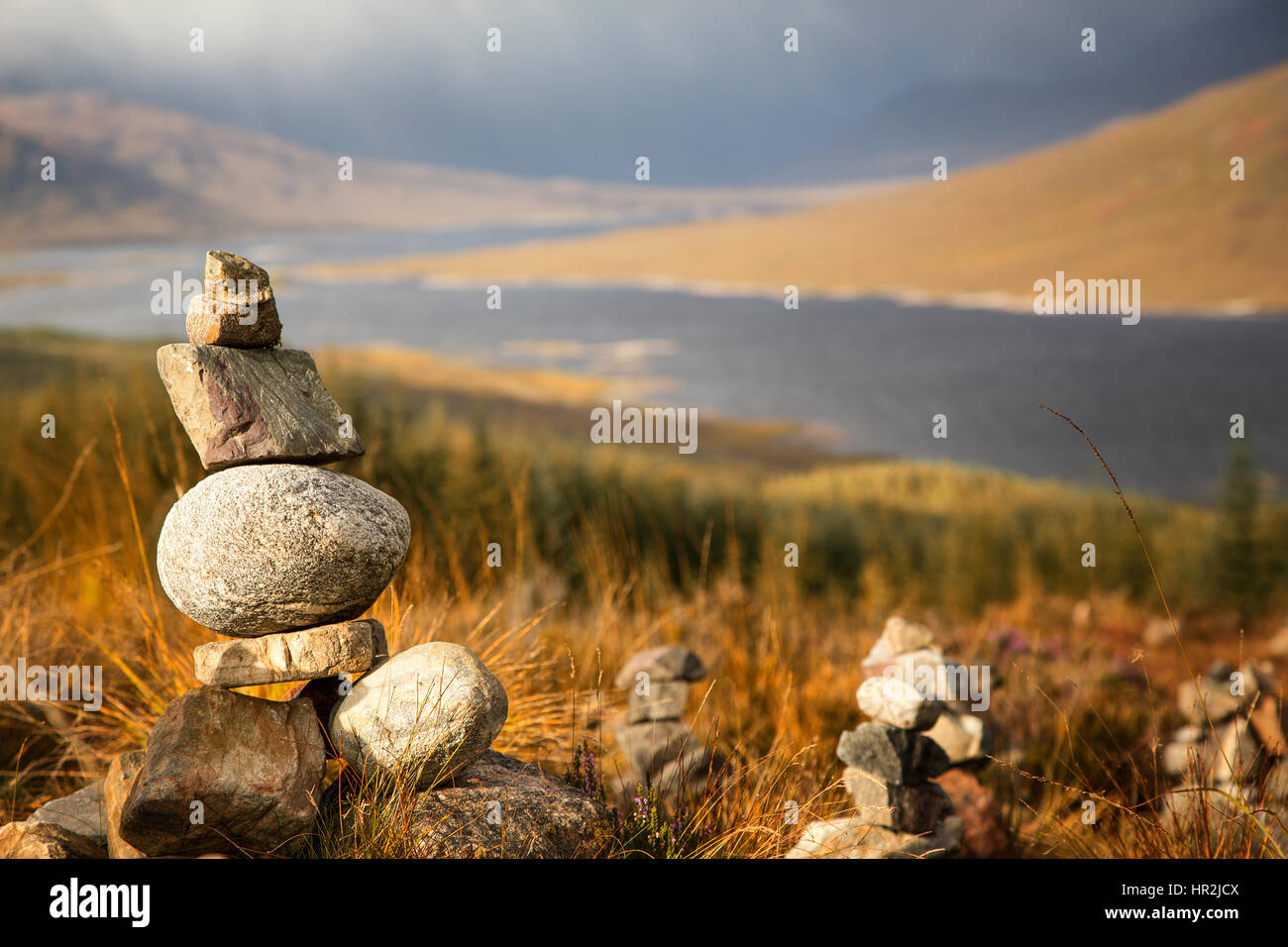Stone stacks in the Scottish Highlands, overlooking the Ardochy Forest towards Loch Garry, Scotland, UK Stock Photo