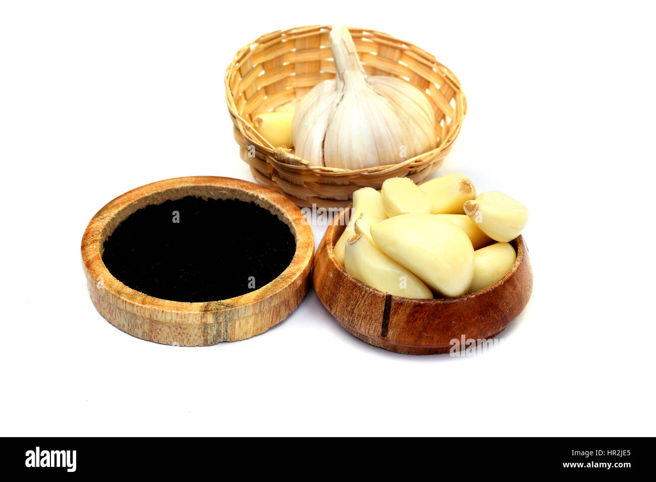 Fresh garlic  & black cumin over white background Stock Photo