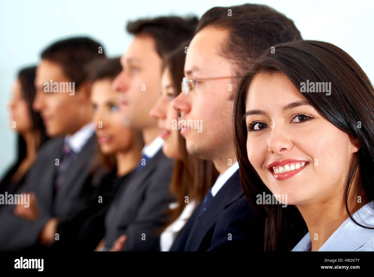 business woman leading a team in an office Stock Photo - Alamy