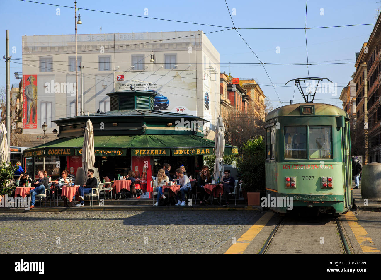Tram and metro stop at a cafe bar and restaurant at the junction of Via Ottaviano and Via Candia, Rome, Italy Stock Photo
