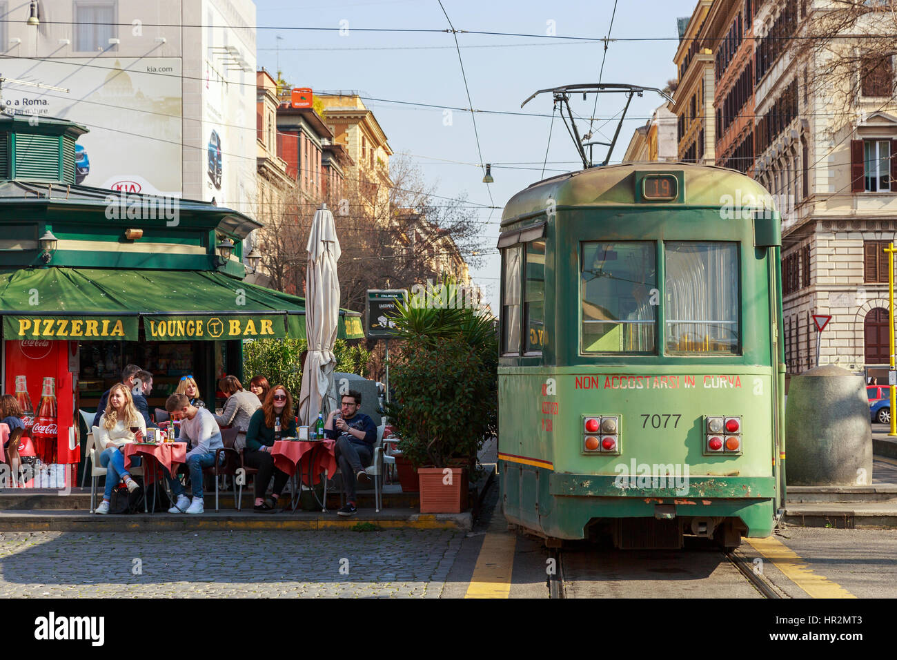Tram and metro stop at a cafe bar and restaurant at the junction of Via Ottaviano and Via Candia, Rome, Italy Stock Photo
