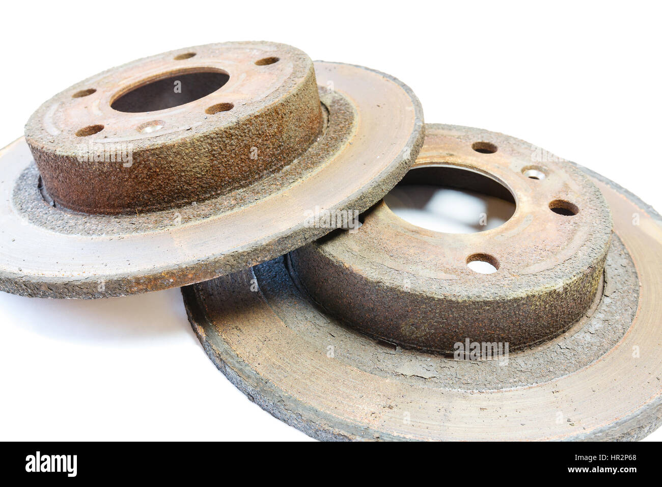 excessively worn rusty brake discs: too thin, covered with rust, with border and with scorched area Stock Photo