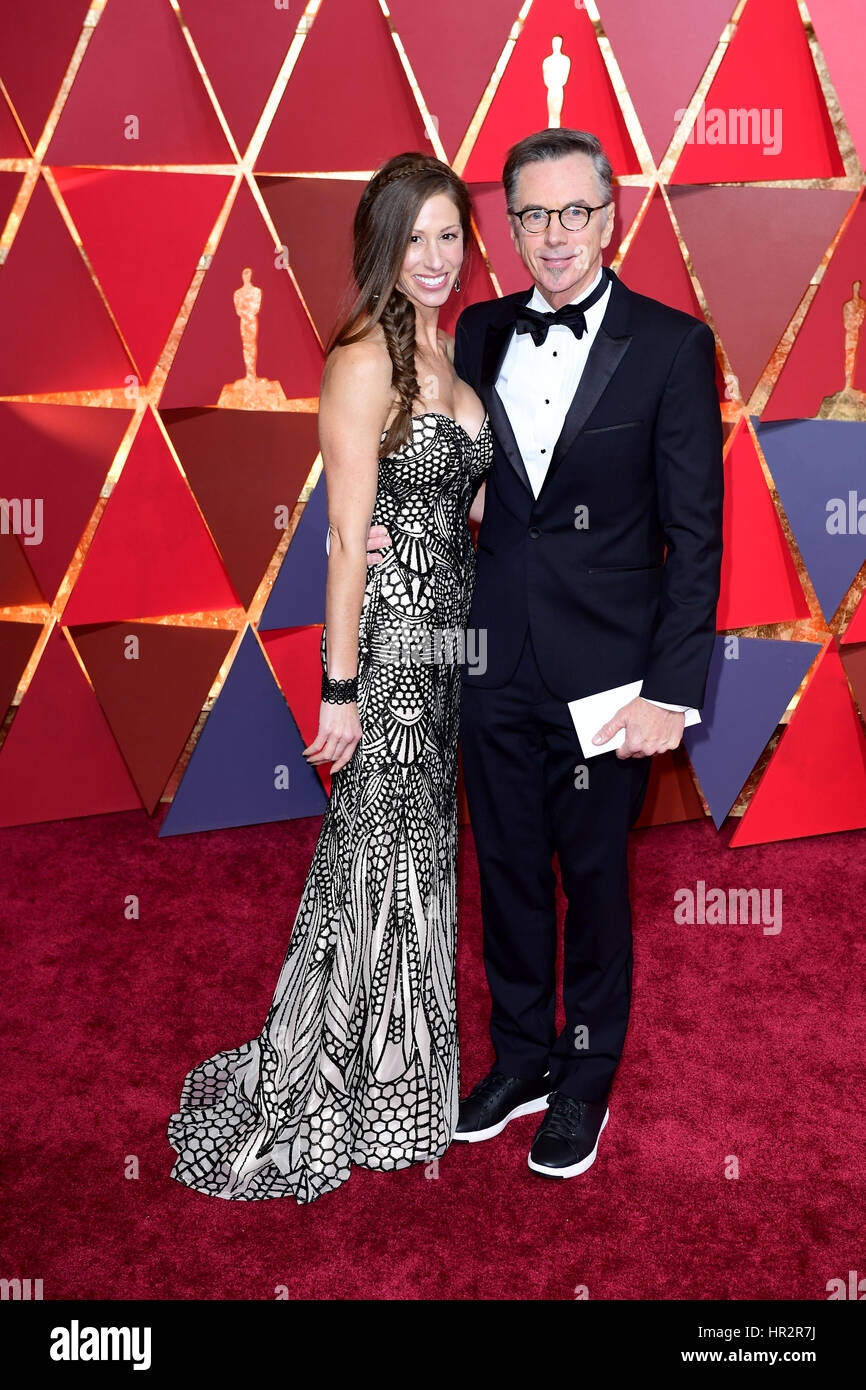 Kevin O'Connell and Heather O'Connell arriving at the 89th Academy